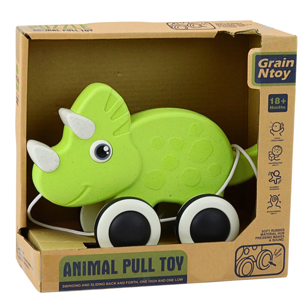 Dinosaurus na kolečkách se šňůrkou – hračka s pískátky | eko zelený
