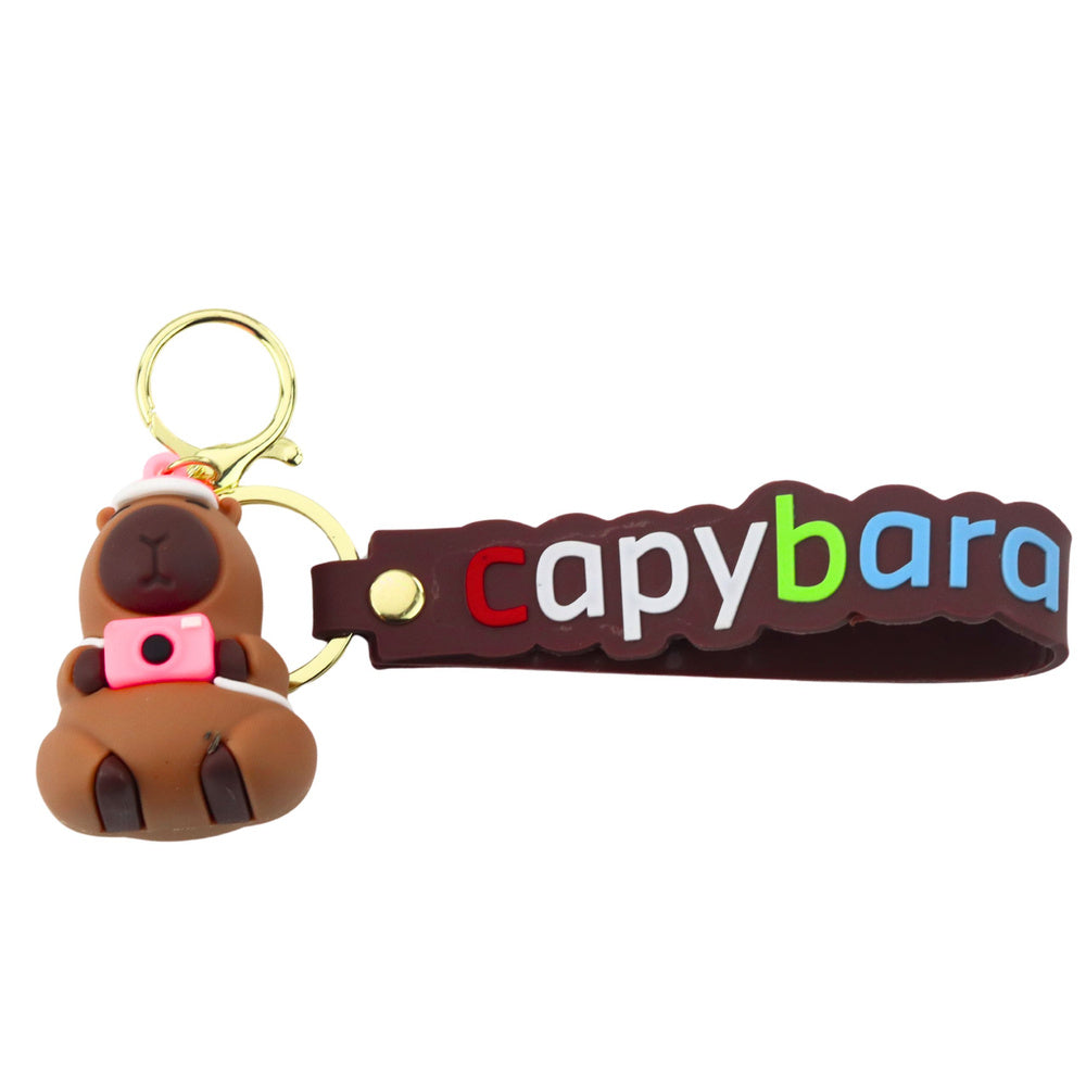 Přívěsek kapybara s fotoaparátem – silikonová figurka