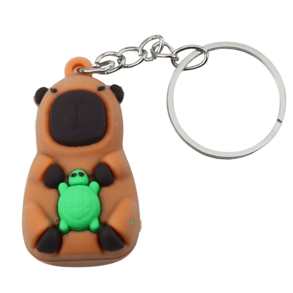 Přívěsek kapybara silikonový – s želvou a fotoaparátem | hnědý