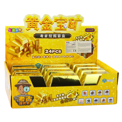 Archeologická vykopávka zlaté cihly s nářadím pro děti