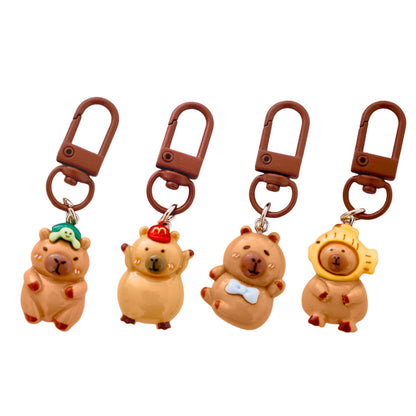 Sada 4 mini přívěsků kapybara na klíče – 3 cm figurky