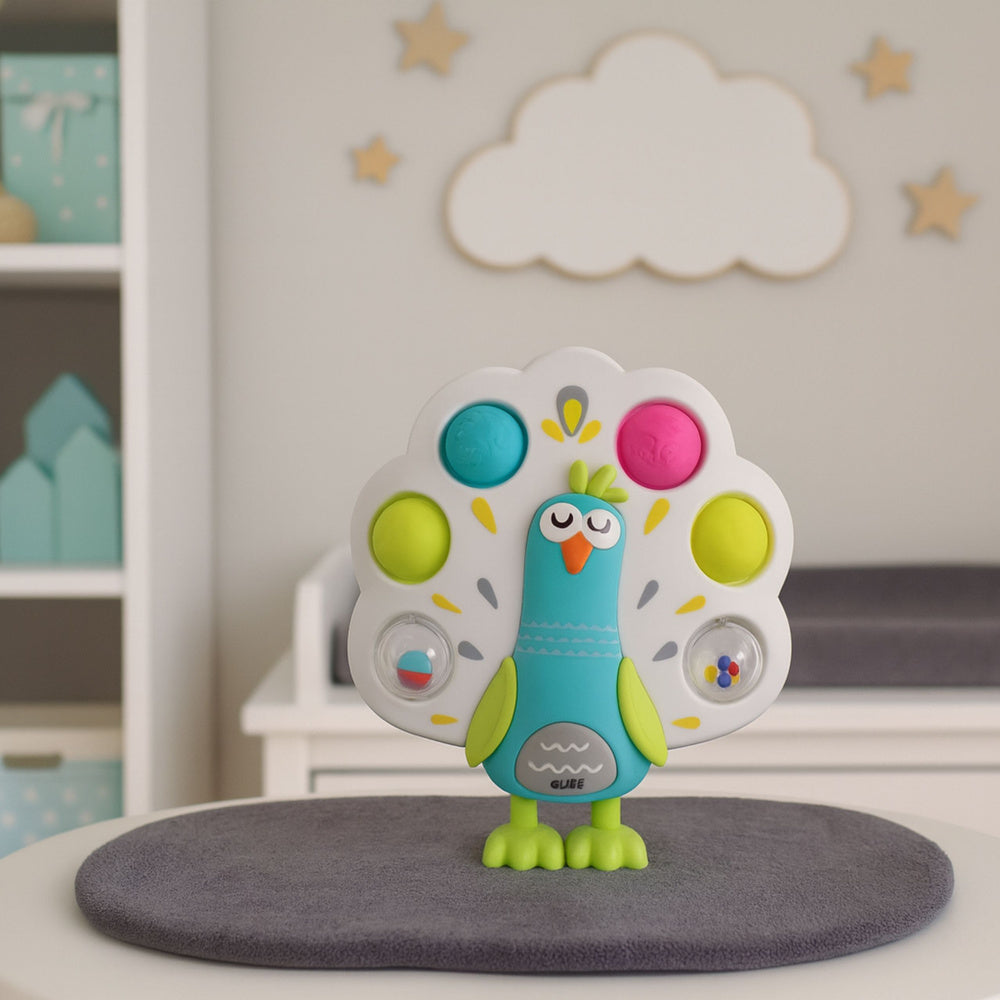 Interaktivní páv – senzorická hračka s bublinkami a rotujícími míčky