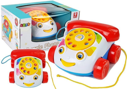 Tahací telefon na kolečkách se sluchátkem a zvuky pro miminka