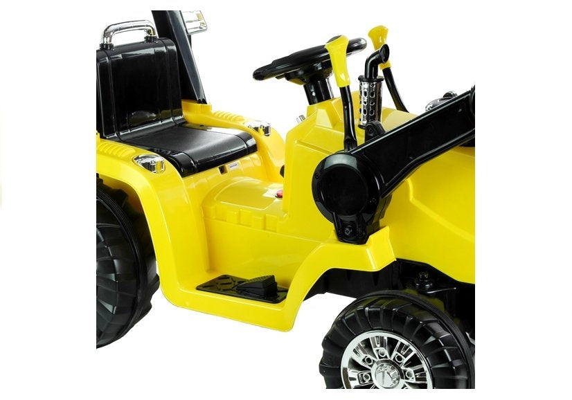 Dětský traktor na akumulator s pohyblivou lžící a pilotem žlutý