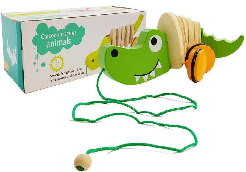 Dřevěný krokodýl na kolečkách s provázkem 18cm zelený
