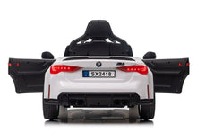 Elektrické auto BMW M4 – na akumulátor bílé | BMW
