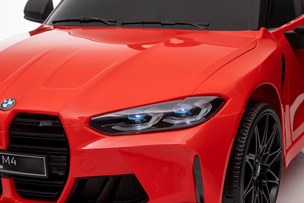 Elektrické auto BMW M4 – na akumulátor červené | BMW