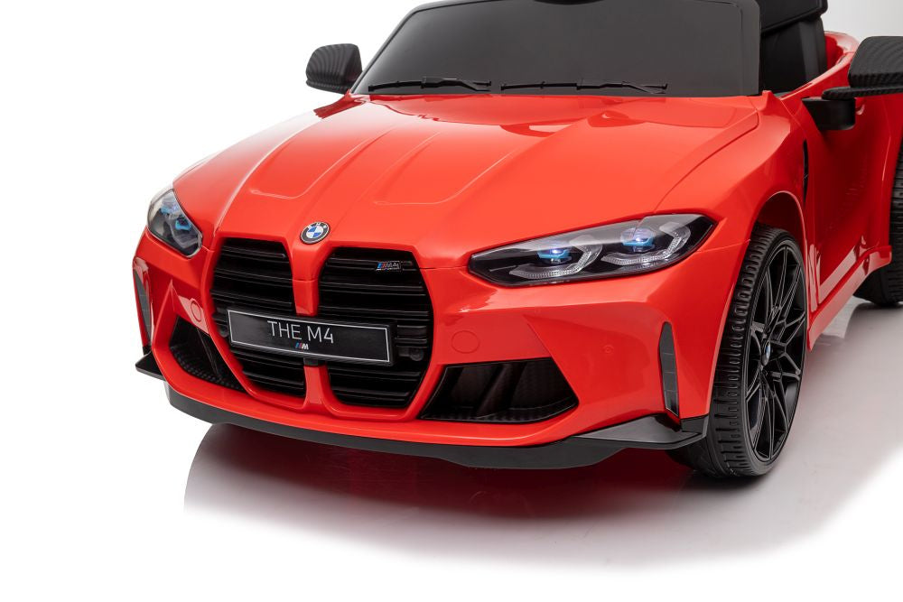 Elektrické auto BMW M4 – na akumulátor červené | BMW