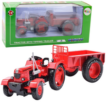 Kovový traktor s přívěsem 1:18 červený