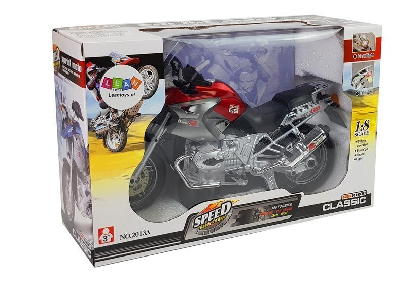 Motocykl na baterie se světly a zvuky červený