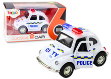 Policejní auto klasické 1:38 s pohonem světly a zvuky bílé