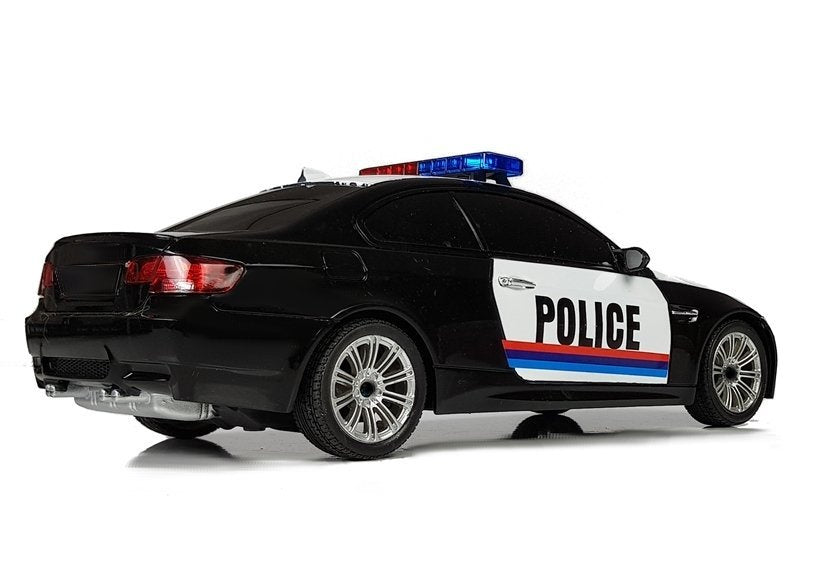 Policejní auto na dálkové ovládání 1:18 s pilotem bílé