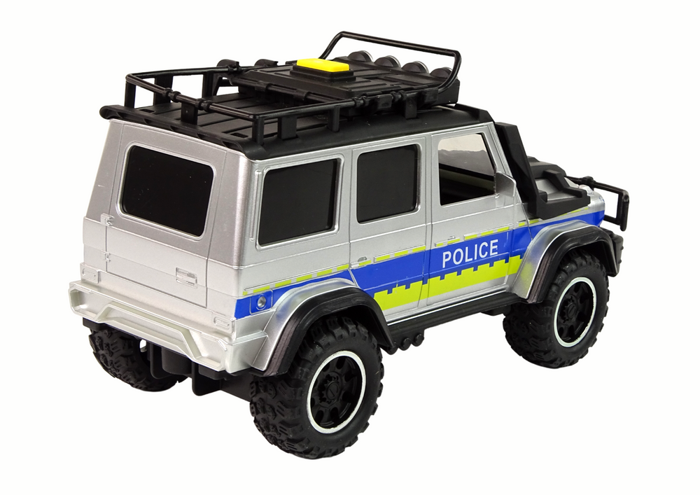 Policejní terénní auto 1:14 s třecím pohonem a zvuky