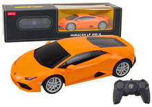 RC auto Lamborghini Huracan 1:24 s pilotem – Rastar oranžové