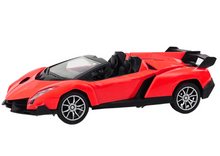 RC auto sportovní na dálkové ovládání 1:16 s pilotem červené