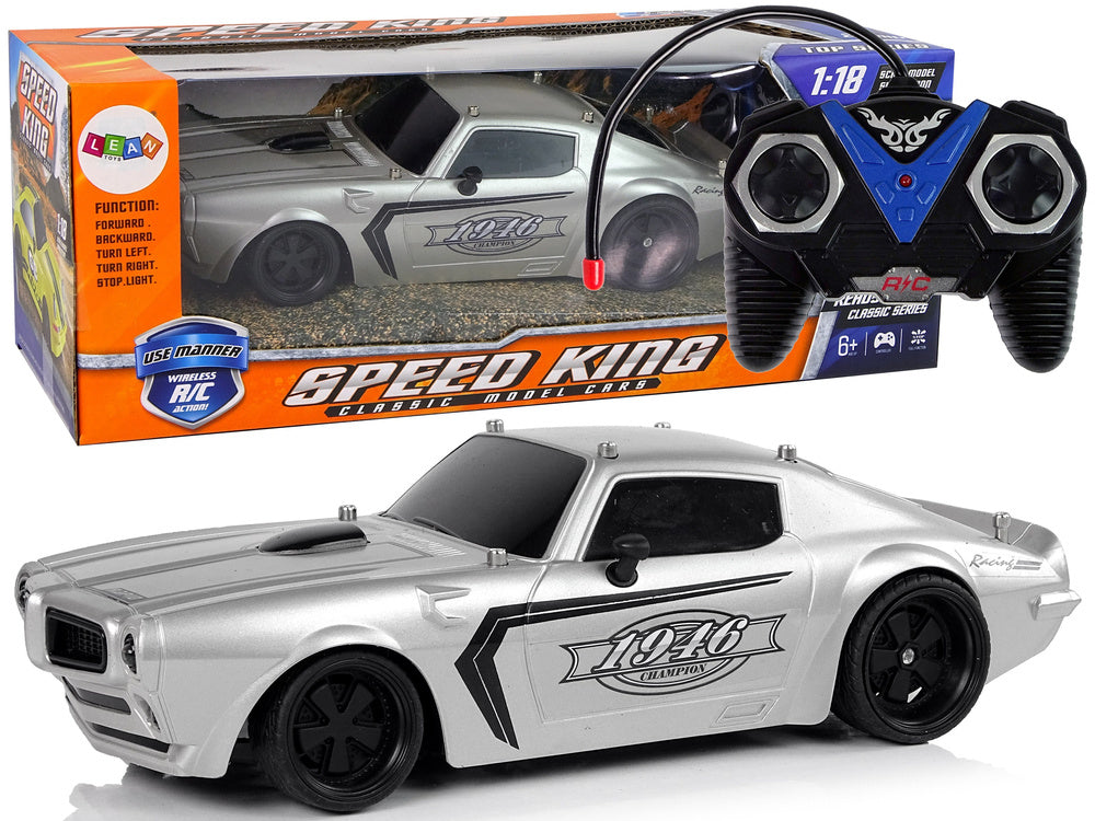Sportovní auto na dálkové ovládání 1:18 s pilotem stříbrné