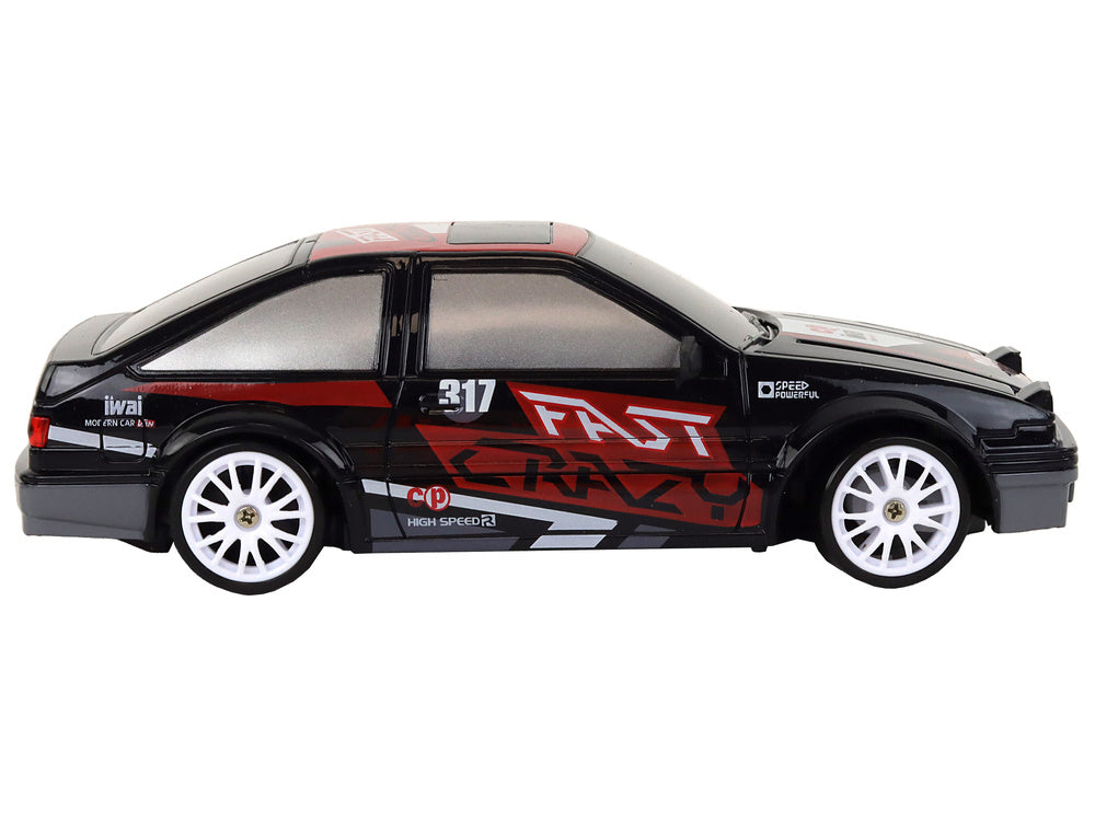 Sportovní auto na dálkové ovládání 1:24 – černé s výměnnými koly