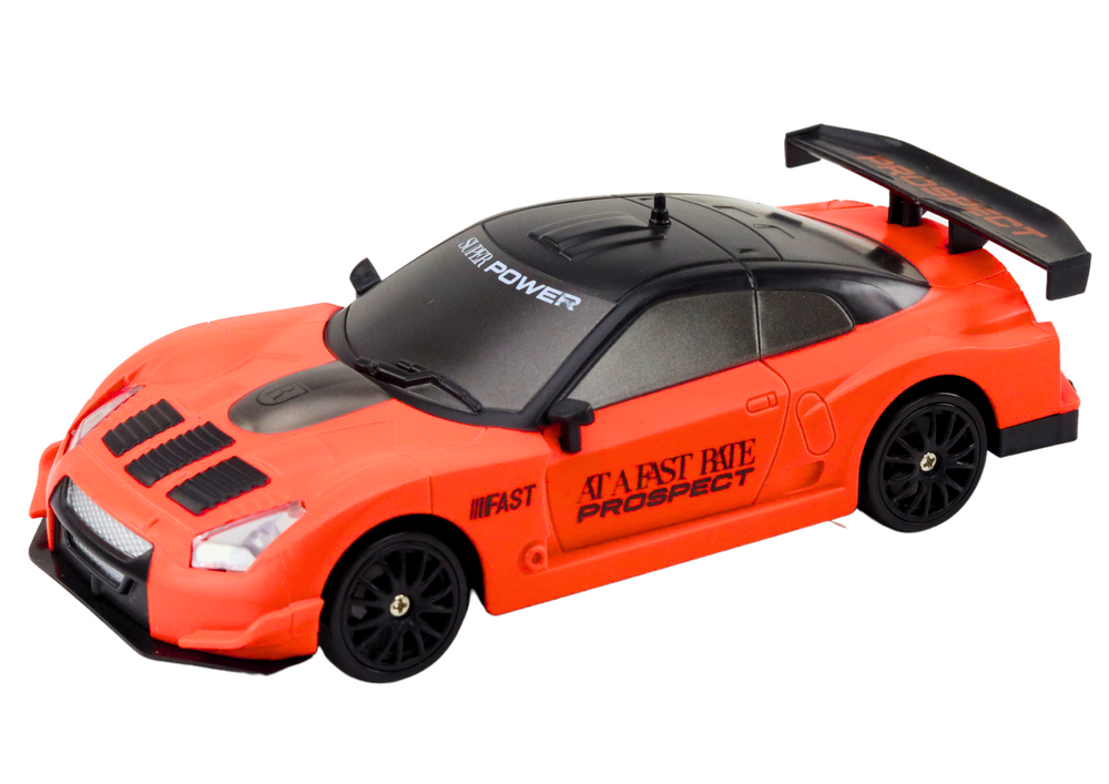 Sportovní auto na dálkové ovládání 1:24 s výměnnými koly oranžové