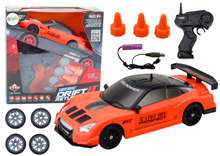 Sportovní auto na dálkové ovládání 1:24 s výměnnými koly oranžové