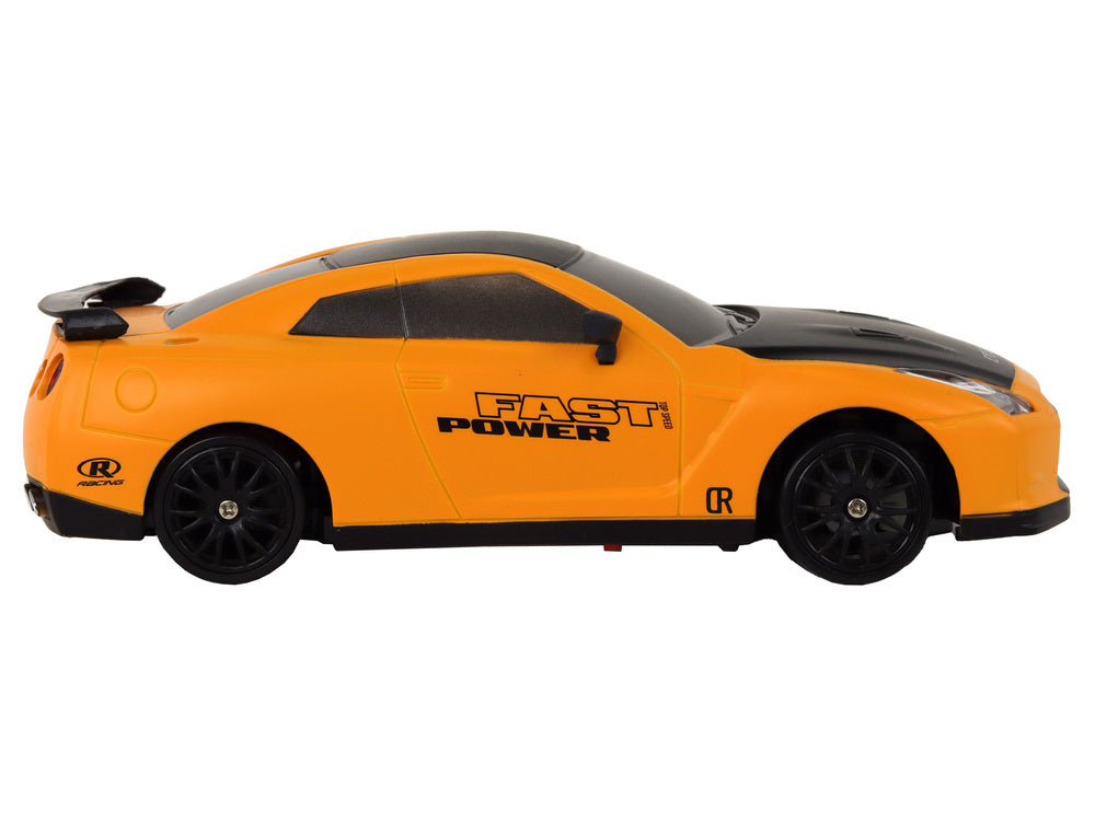 Sportovní auto na dálkové ovládání 1:24 – žluté s výměnnými koly