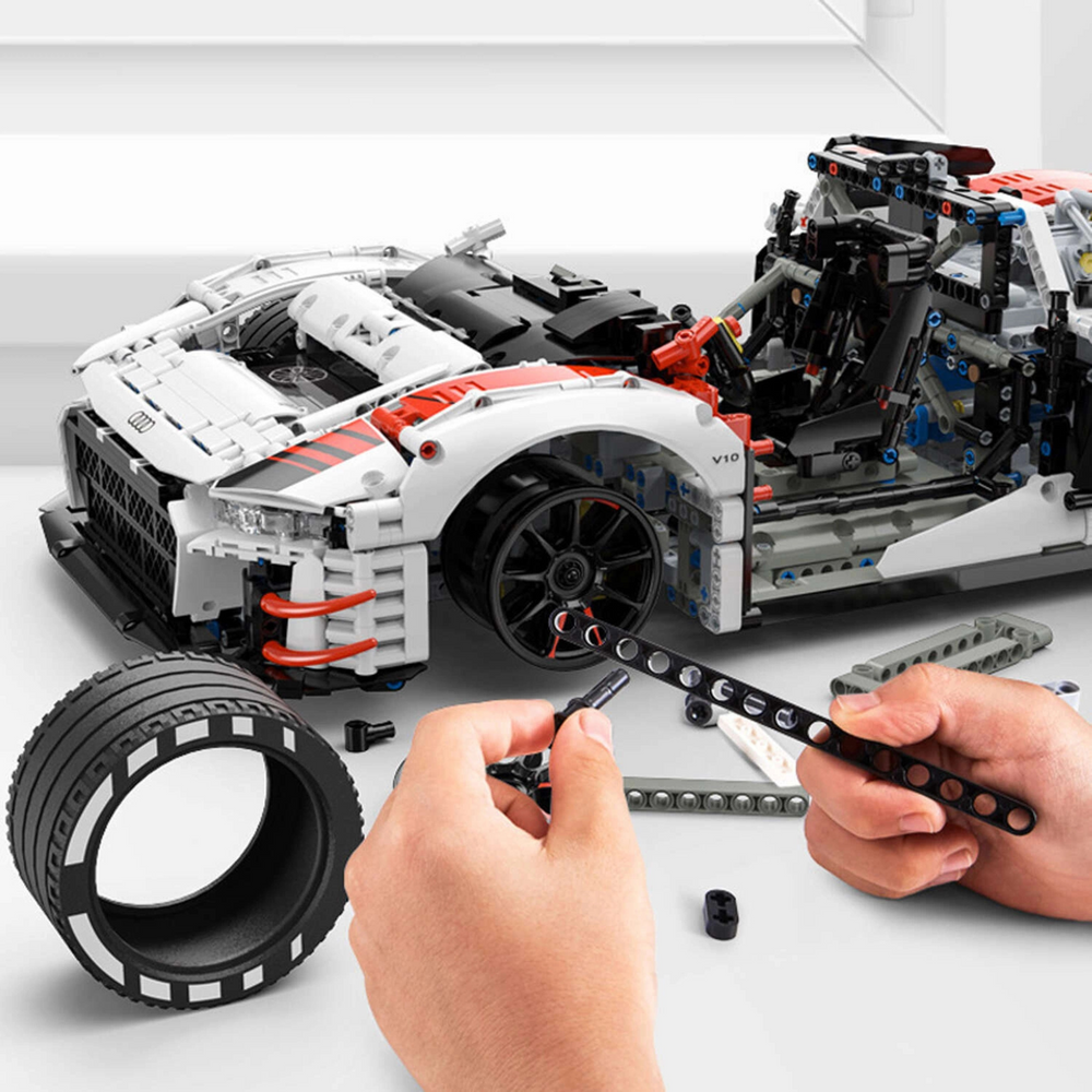 Stavebnice RC auto Audi R8 1:8 s dálkovým ovládáním – Rastar