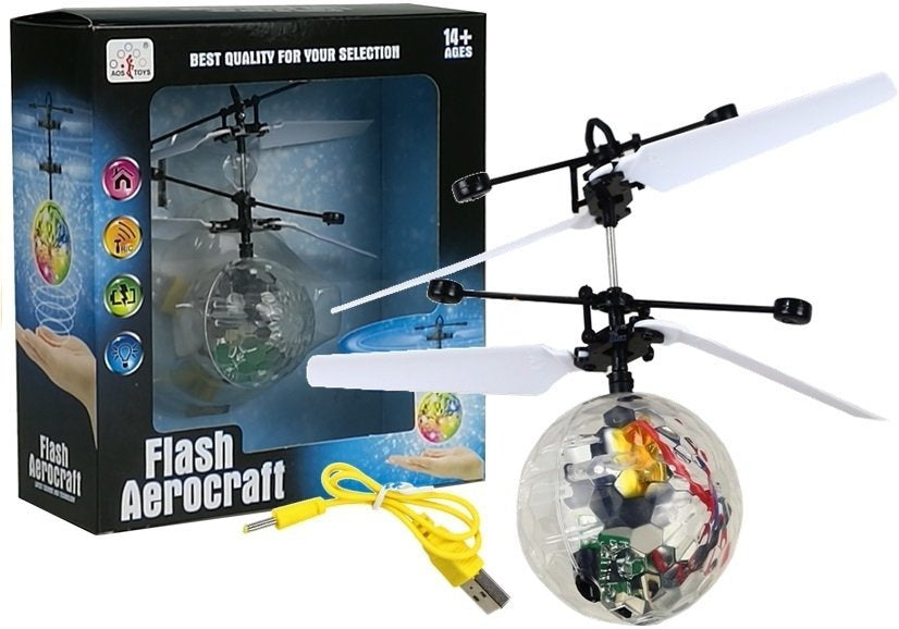 Svítící létající magická koule ovládaná rukou s pilotem