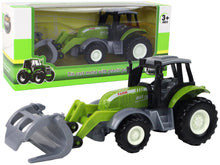 Traktor kopačka s dřevěnými kleštěmi – gumová kola | zelená