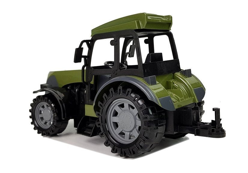 Traktor na dálkové ovládání s přívěsem a balíky dřeva zelený