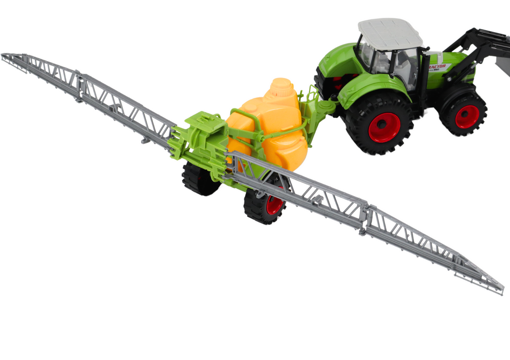 Traktor s kopačkou a postřikovačem na setrvačník zelený
