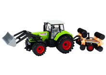 Traktor s kopačkou a talířovou bronou na setrvačník zelený