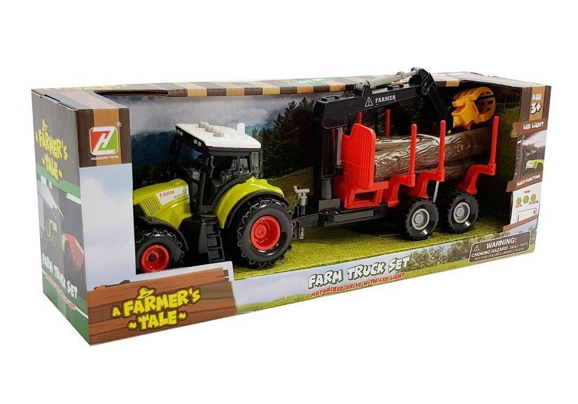 Traktor s lesním přívěsem jeřábem a dřevěnými kmeny