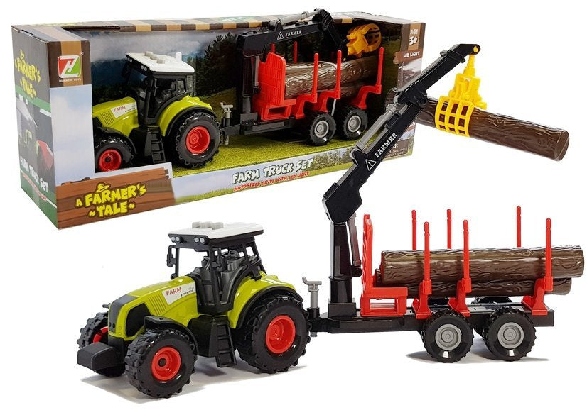 Traktor s lesním přívěsem jeřábem a dřevěnými kmeny