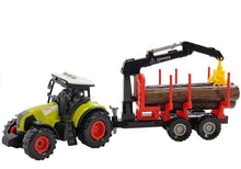 Traktor s lesním přívěsem jeřábem a dřevěnými kmeny