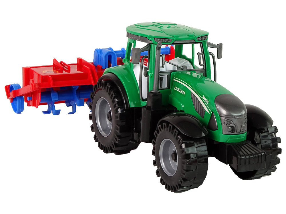 Traktor s pluhem frikční pohon červený
