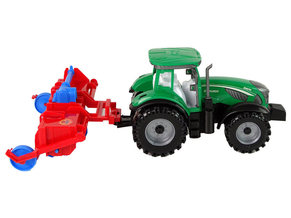 Traktor s pluhem frikční pohon červený