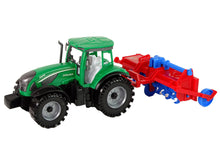 Traktor s pluhem frikční pohon červený