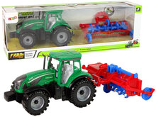 Traktor s pluhem frikční pohon červený