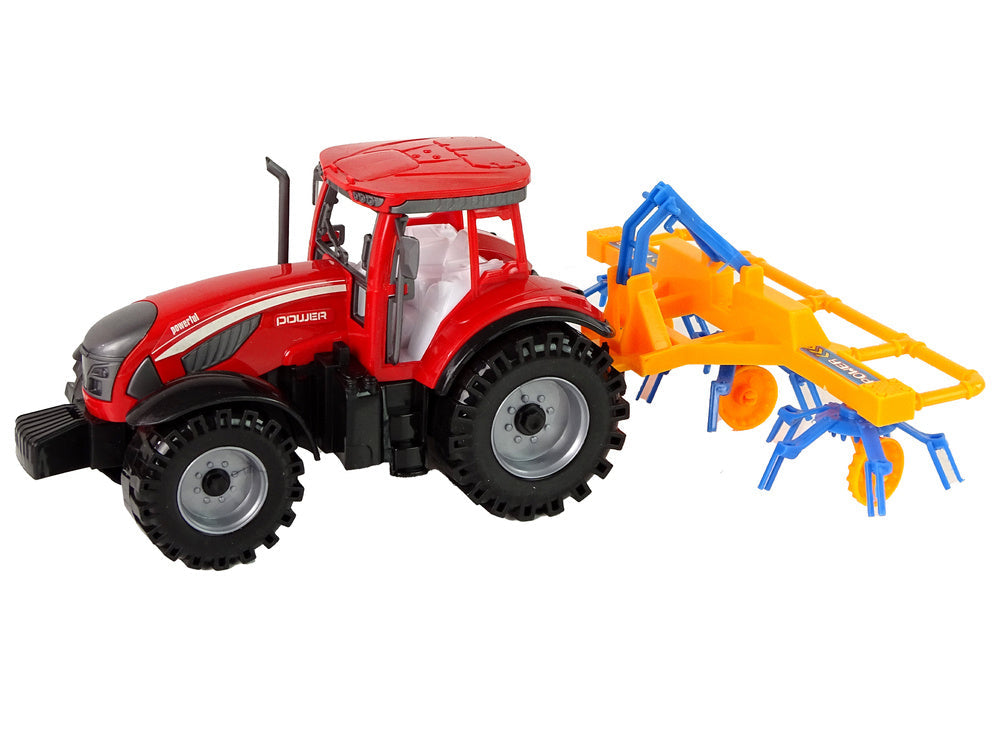 Traktor se shrnovačem frikční pohon červený