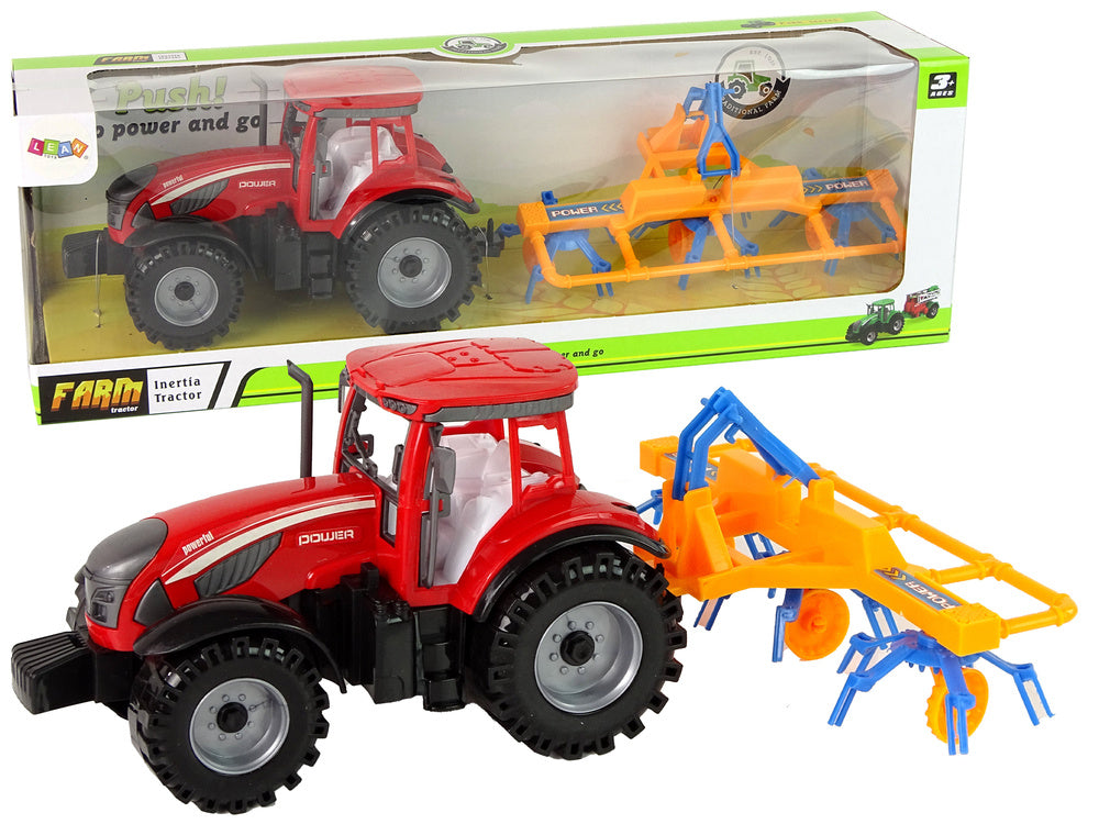 Traktor se shrnovačem frikční pohon červený