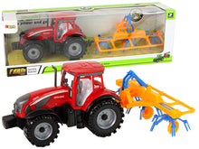 Traktor se shrnovačem frikční pohon červený