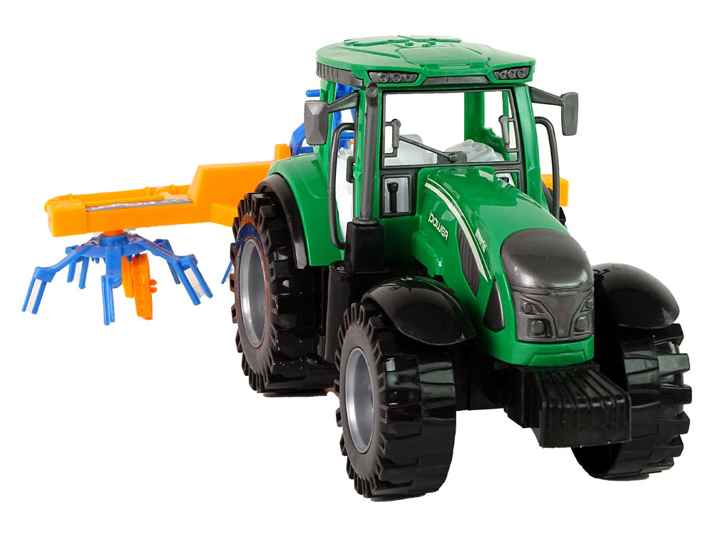 Traktor se shrnovačem třecí pohon zelený