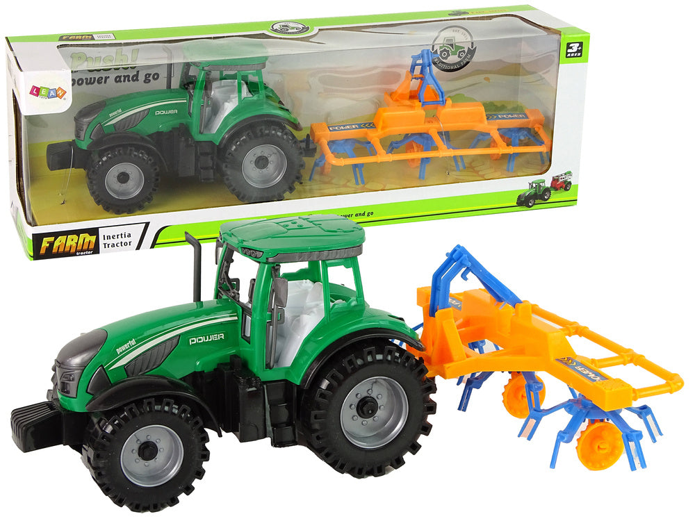 Traktor se shrnovačem třecí pohon zelený