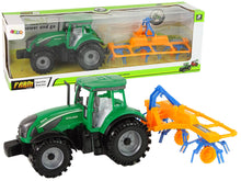 Traktor se shrnovačem třecí pohon zelený