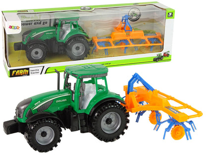 Traktor se shrnovačem třecí pohon zelený