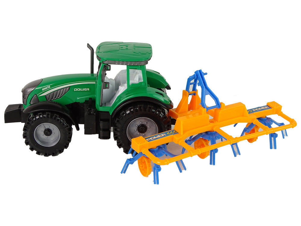 Traktor se shrnovačem třecí pohon zelený