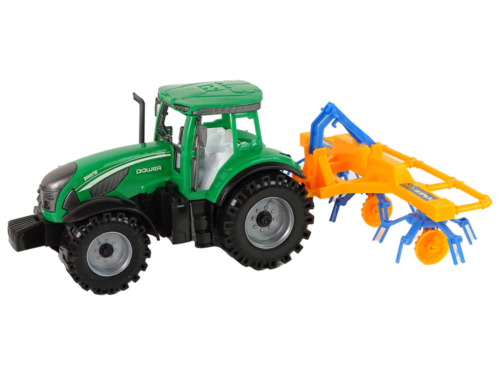 Traktor se shrnovačem třecí pohon zelený