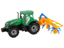 Traktor se shrnovačem třecí pohon zelený