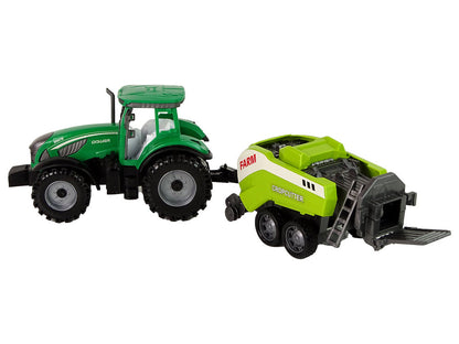 Traktor zemědělský se secím strojem na setrvačník zelený