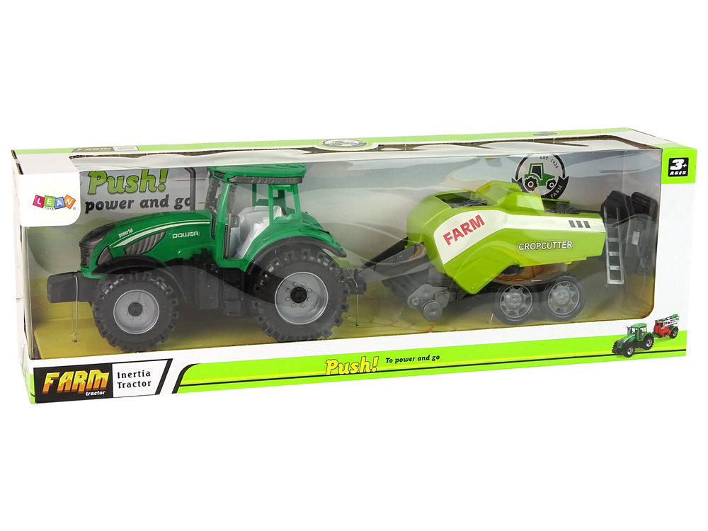 Traktor zemědělský se secím strojem na setrvačník zelený