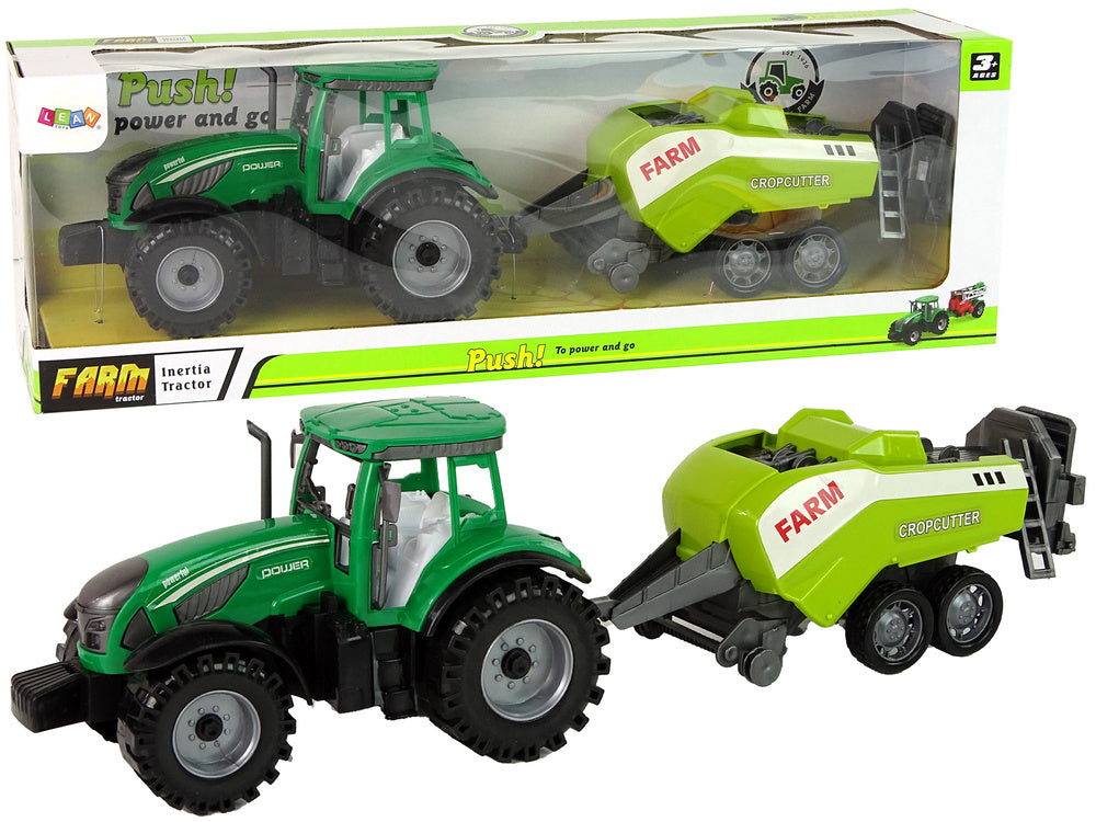 Traktor zemědělský se secím strojem na setrvačník zelený